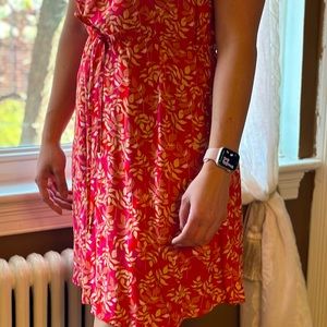 Lightweight dress from Paris with adjustable tie waist. Never worn.